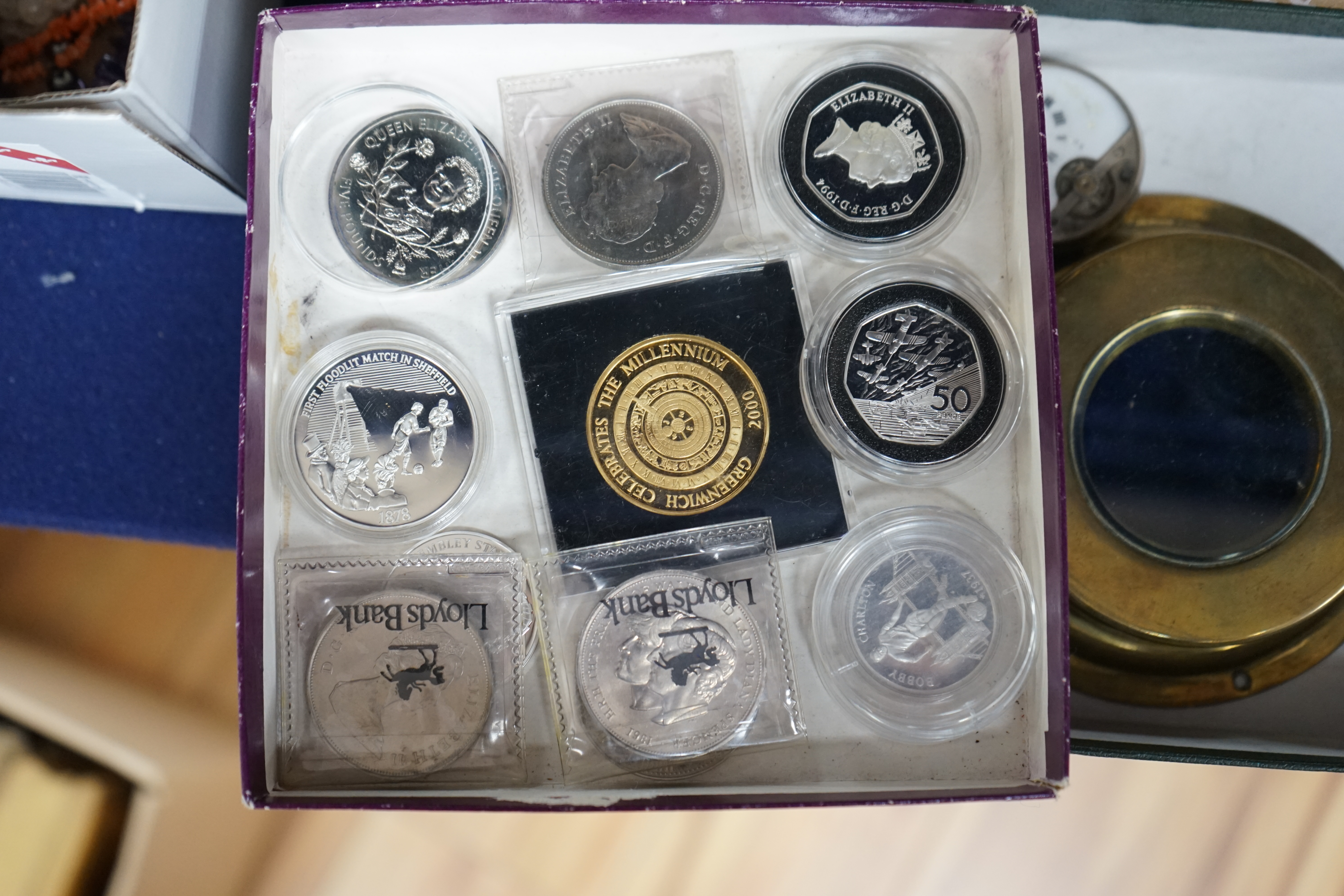 An album of coins and other loose coins, including an 1891 silver crown, 1901 silver trade dollar, commemorative 50p pieces, etc. Condition - fair.